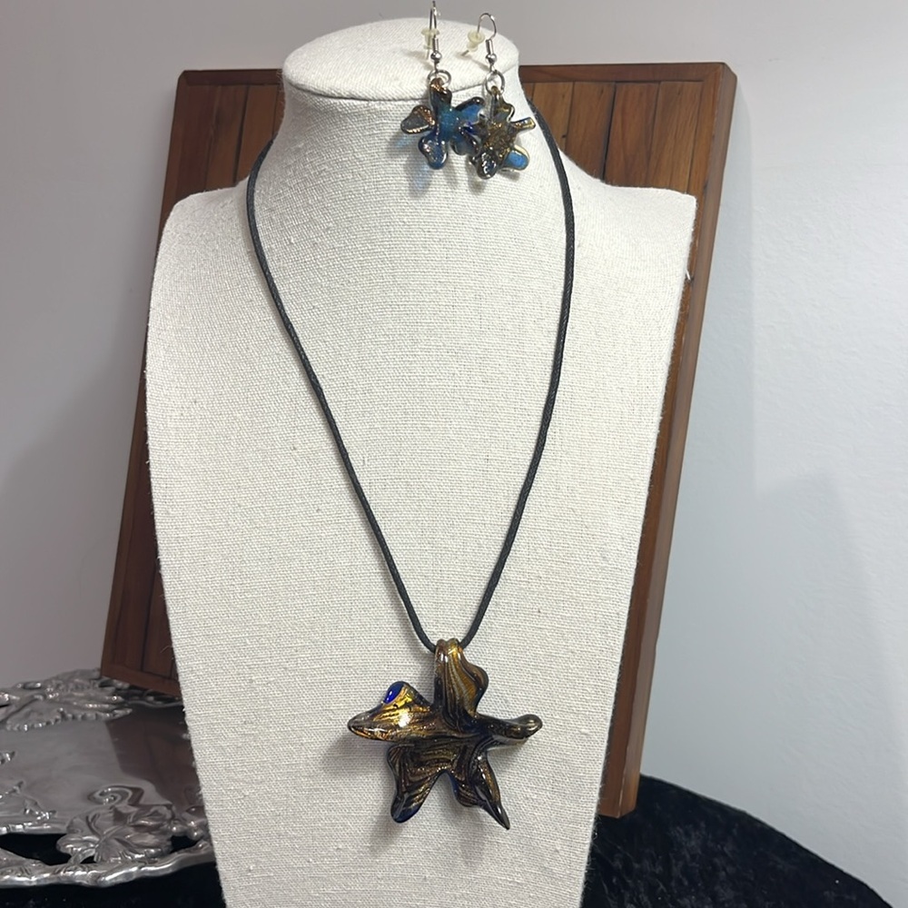 Art Glass Gold and Blue Shimmering Star Pendant with matching earrings